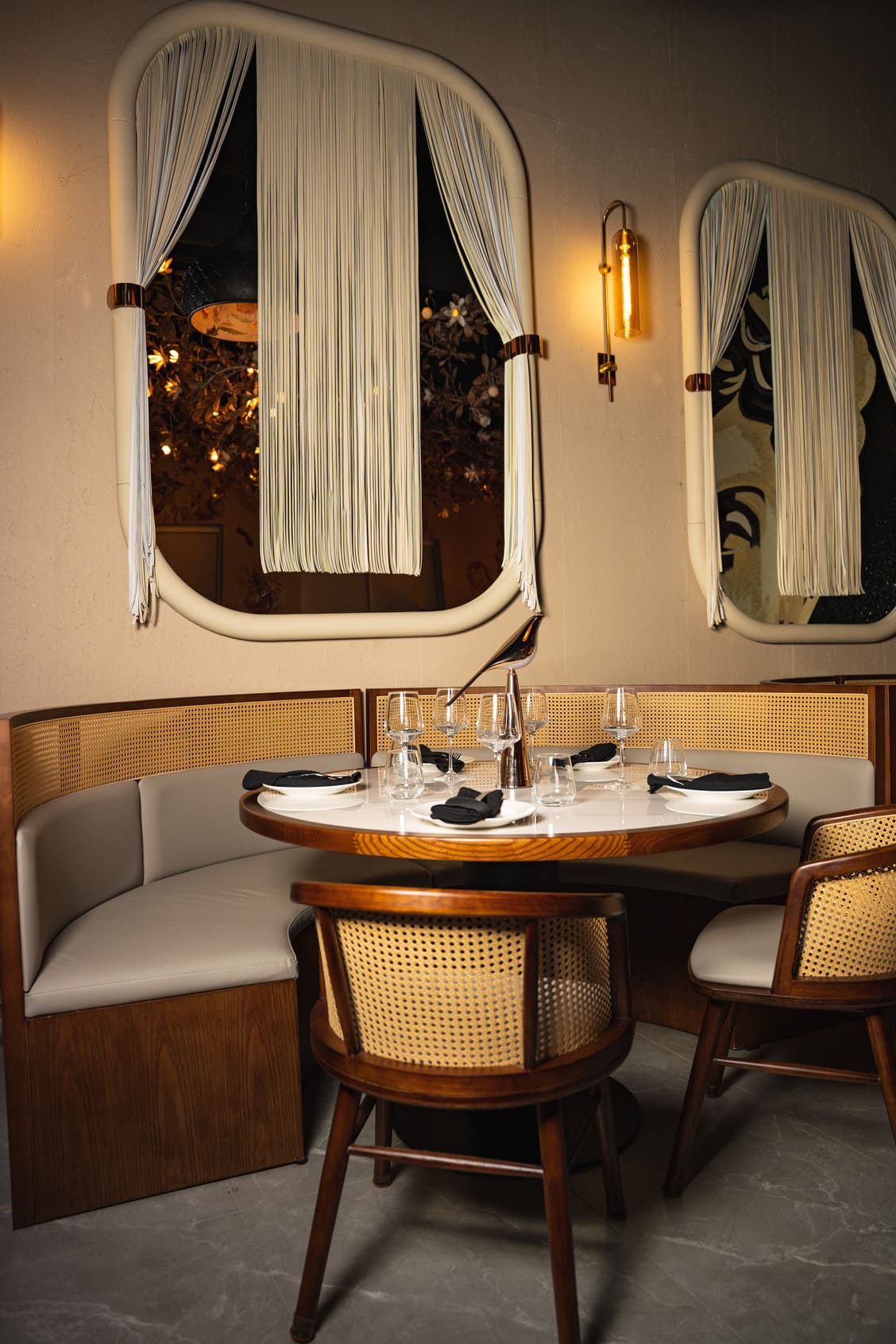 The private table under the mirrors